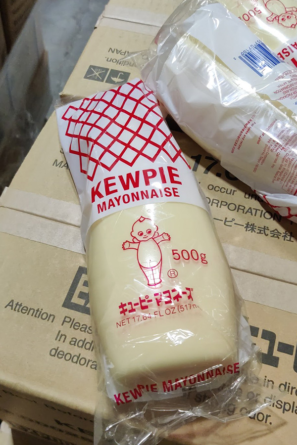 500g Kewpie Mayonnaise in plastic packaging displayed on cardboard boxes