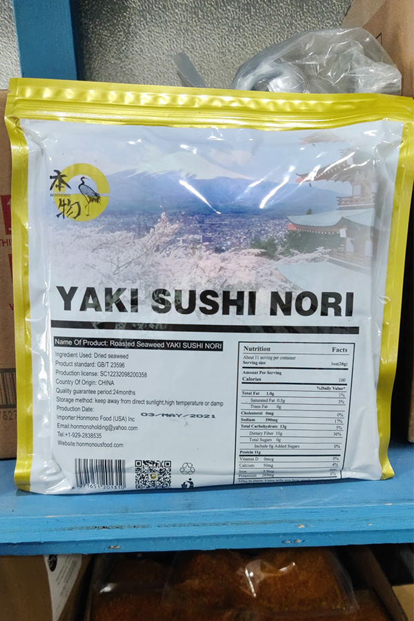 Pack of roasted seaweed Yaki Sushi Nori with mountain landscape design on packaging